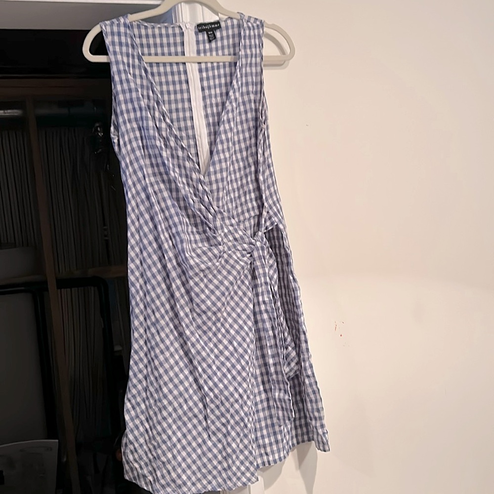 Tribal femme wrap dress in gingham blue and white. Back zip pockets
